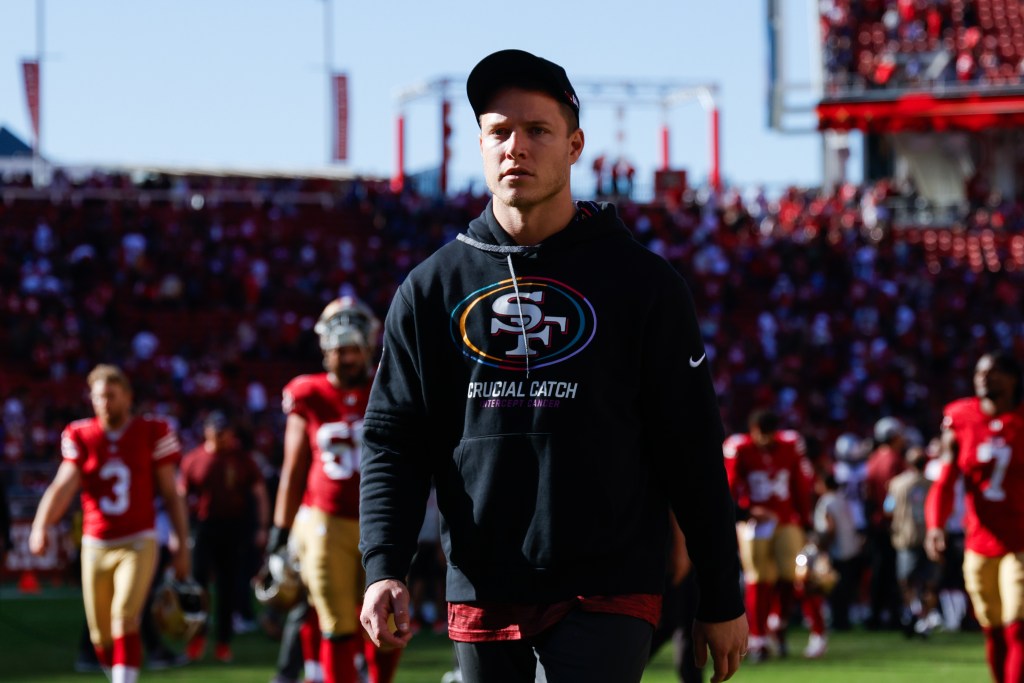 San Francisco 49ers running back Christian McCaffrey (23) walks off the field after the game against the New England Patriots at Levi's Stadium.