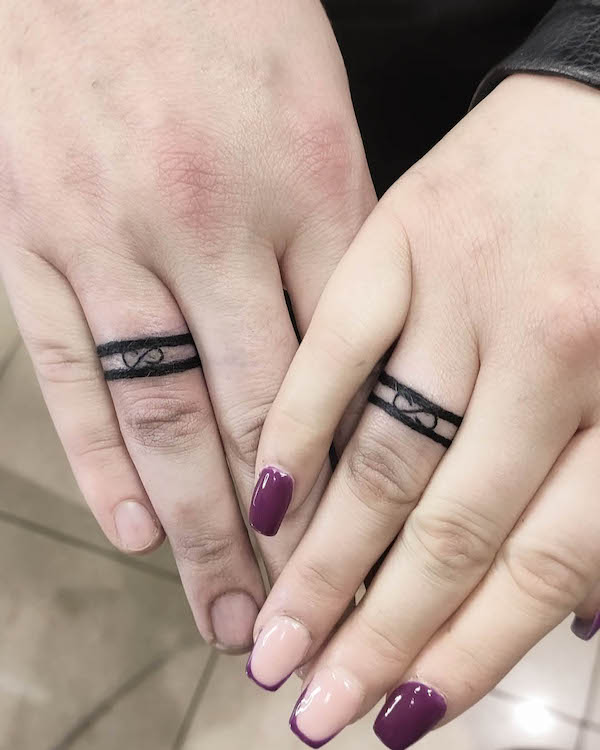 Infinity wedding ring tattoos by @inkdividual_tattoo_and_beauty